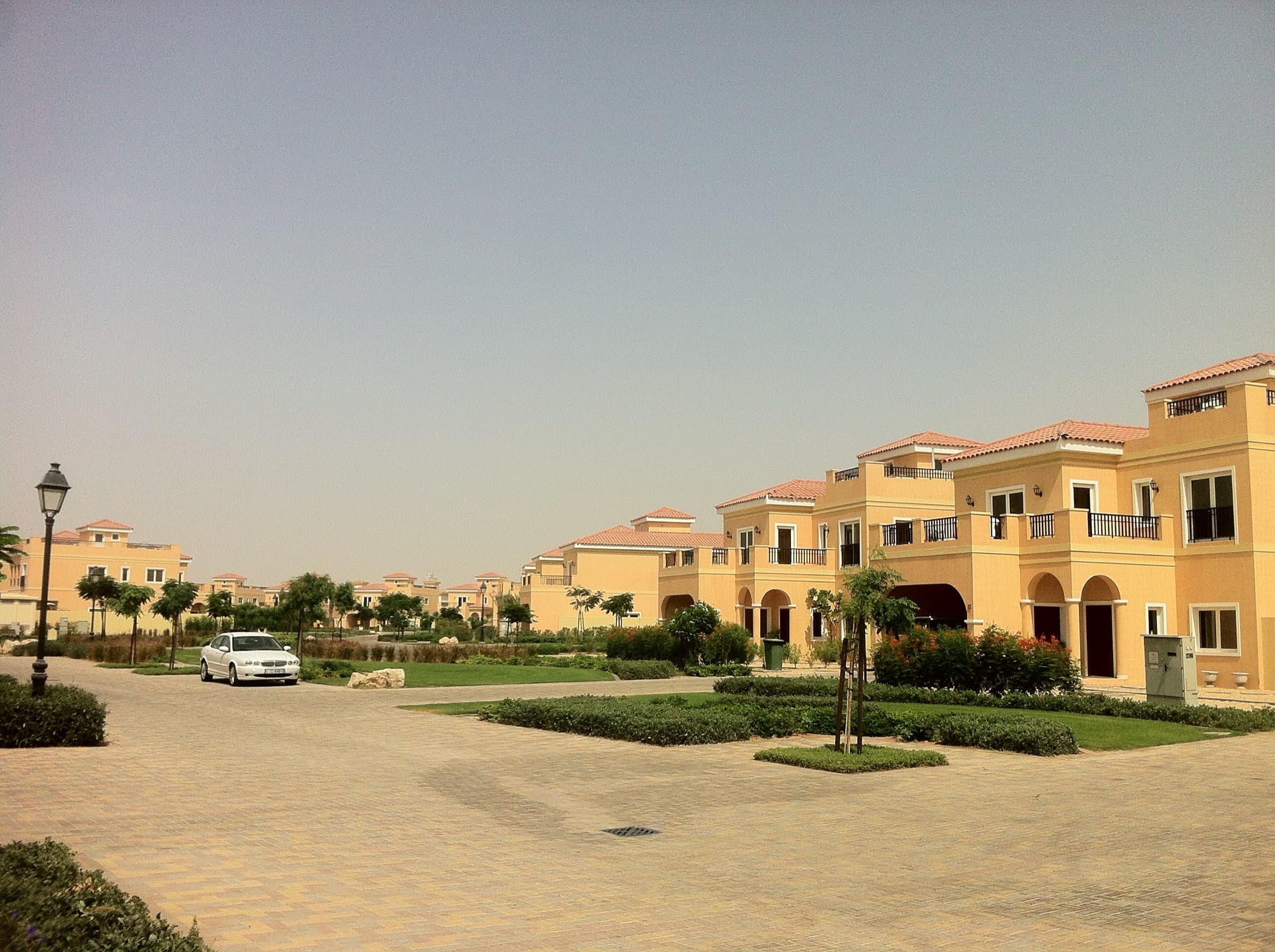 Low-rise Mediterranean-style villas and townhouses in a landscaped Dubai residential community